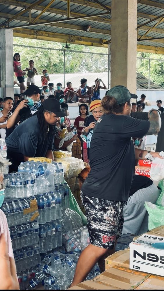 Papa Tantan Care distributing water and supplies at a relief drive